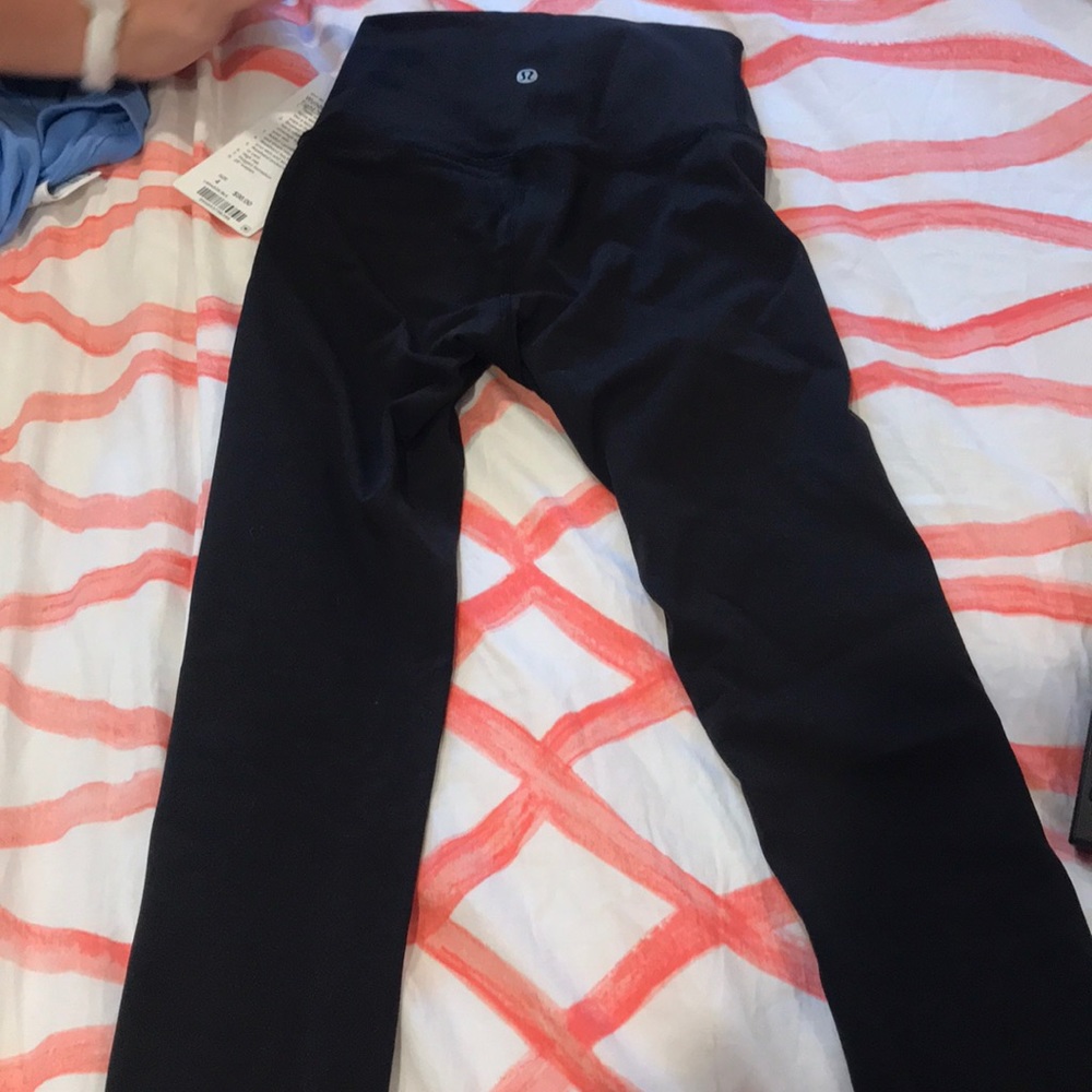 Never worn lulu lemon black high rise leggings